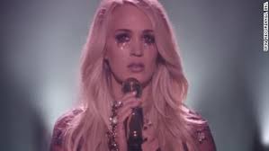 Since the accident, carrie's stayed out of the public eye and even told her fans back in january that she may not look the same. Carrie Underwood S First Music Video Since Accident Cnn Video