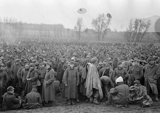 Pictures of German Prisoners in a holding area in the US 2nd Armored  Division area of advance into Germany - April 1945 Some of these pictures  were possibly taken in / near