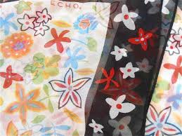 Wear this as an evening shawl, a flirty long scarf or as a summer shawl. Vintage Multicolored Flower Silk Scarf Chiffon Retro Power Daisy Shape Floral Pattern Red Orange Blue Green Yellow Black Echo Head Bandanna Villa Collezione Boutique