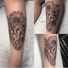 Leopard print heart with purple bow tattoo. Strange World Tattoo