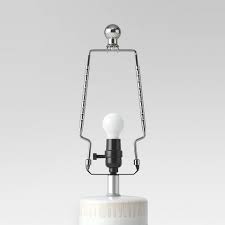 The size indicates the height including the saddle (when attached, not separated as shown in the photo at left) but not the threaded finial stud. Metal Lamp Harp Threshold Target