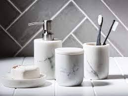 The printable gift voucher is a perfect solution to the increasingly common problem of what to give as a wedding present when friends and family who have been shacked up for years and even raised children together finally decide to the the knot in their middle/layer years. Marble Bathroom Accessories Set Novocom Top