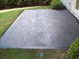 Scoring lines and acid staining a concrete porch or patio can really serve to dress it up and give layout the pattern on the concrete using a chalk line. Stained Concrete Concrete Patio Makeover Concrete Stain Patio Paint Concrete Patio