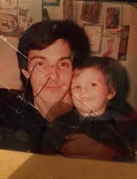 Can someone please fix this photo? This picture is my daughter and my  niece. Both grown now, but this picture is stuck to glass and it has tiny  tears in photo ink-