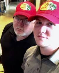 This is me and my friend Matt Presley. He is Elvis Presley's cousin. He  gifted me this guitar. It's signed by the founder of Tito's Vodka. Matt  owns a liquor store in