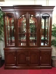 American primitive colonial cherry wood wavy glass corner cupboard china cabinet. Harden Furniture Solid Cherry Lighted China Cabinet