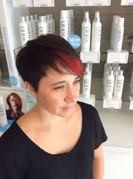 Short hair pixie cut with a flash of red