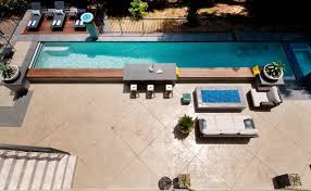Pool deck tile design ideas. 8 Most Popular Materials For Swimming Pool Decks