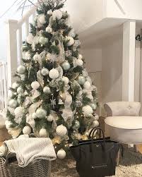 This balsam hill flocked tree is so pretty just by itself. T R E E 2 Hallway Tree Because I Used All The Gold Decorations On The Loung Ba Cool Christmas Trees Gold Christmas Decorations Pretty Christmas Trees