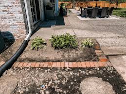 If you have an existing stone or concrete patio, why not add brick borders around it? How To Add A Charming Brick Border To Garden Building Bluebird