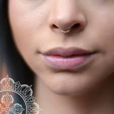 Gorgeous septum piercing by Tom Gottschalk