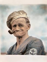 This is Frank Rocky Fiegel. (1868-1947). A bartender and general laborer  who became somewhat famous late in his life. He was the real life  inspiration for E. C. Segar's ever, popular cartoon