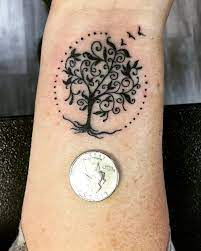 Lettering with tree of life tattoo on right chest for girls. Tree Of Life Tattoo Tattoos Life Tattoos Tree Of Life Tattoo