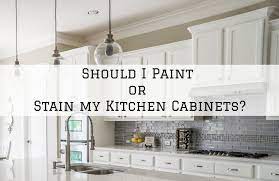 I would much rather see these stained and made to look new rather than paint them. Should I Paint Or Stain My Kitchen Cabinets Michael Hines Painting Ione Ca Painting Contractor