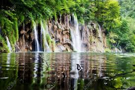 Расположен он не на одноименном острове, как можно подумать, а в южной части страны, неподалеку от сплита. Summer View Of Beautiful Waterfalls In Plitvice Lakes National Stock Photo Picture And Royalty Free Image Image 37033120