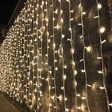 Amazon Com Twinkle Star 300 Led Window Curtain String Light Wedding Party Home Garden Bedroom Outdoor Indoor Wall Decorations Warm White Home Kitchen
