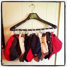 1 Coat Hanger 10 Shower Curtain Hooks Super Space Saving Hat Storage Via Pinterest Cheap Storage Creative Storage Diy Storage