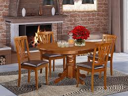 Please note that most models shown in the different woods are also available in other woods. Buy East West Furniture Dinette Table Set 4 Awesome Wood Dining Chairs A Gorgeous Wood Table Faux Leather Seat And Saddle Brown Finnish Butterfly Leaf Round Wooden Table Online In Indonesia B00tv48i2i