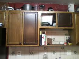 Sanding And Staining Old Kitchen Cabinets Stained Kitchen Cabinets Restaining Kitchen Cabinets Kitchen Cabinets Decor