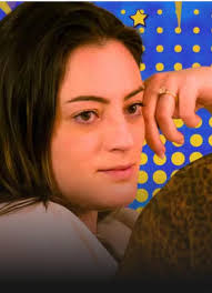 Humorous Scene from Resident Alien where Harry Breastfeeds