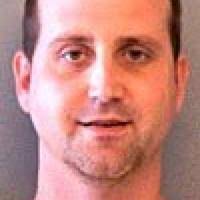 Teacher arrested in theft of beer