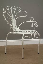 Vintage metal peacock chair, outdoor patio chair 86home 5 out of 5 stars (541) sale price $1,402.50 $ 1,402.50 $ 1,650.00 original price $1,650.00 (15% off) free shipping add to favorites quick view 1960's salternini wrought iron patio set. White Finish Wrought Metal Scroll Work Garden Peacock Chair H89cm W69cm D52cm Antiques Interiors
