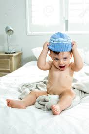 Maybe you would like to learn more about one of these? Full Length Of Shirtless Cute Baby Boy Wearing Knit Hat On Bed Stock Photo Picture And Royalty Free Image Image 54785536