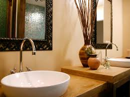 The rendezvous sink by cenk kara is a fluid and organic shape that seems to spiral upwards as though caught in a water spout, which is rather appropriate considering it is a type of water spout. Vessel Sink Bathroom Faucets Hgtv