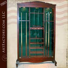 The cuestix 8 pool cue roman wall rack helps store and display eight pool cues, easily and safely. Pool Cue Cabinets Custom Furniture Pool Stick Racks