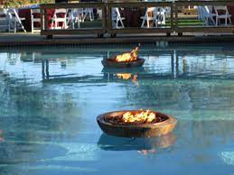 Fire pits serve as a social gathering spot regardless of the season. Floating Fire Pit Encore Creative Fire Pit Fire Pit Patio Fire Pit Size