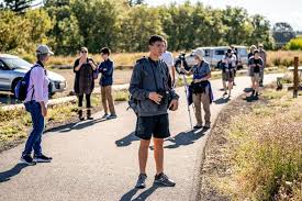 Birding brigade brandishes binoculars