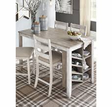 Bowery hill counter height square dining table with wine storage base and integrated lazy susan in cappuccino. Signature Design Skempton Counter Height Table With Storage By Ashley