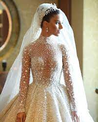 Head Over Heels In Love With This Glamorous Zuhair Murad Gown Featuring Delicate Jewel Embellishments Wedding Dresses Wedding Dress Long Sleeve Gowns