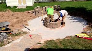 Chris kattan christopher lowell skit. Stacking Retaining Wall Block For A Fire Pit In Littlestown Pa Ryan S Landscaping Youtube