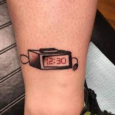 A font based on the look of an alarm clock. Tiny Alarm Clock Tattoo Hixsontn Tattoochattanooga Chattanoogatattoo Hixsontntattoo Mattooreynolds Clock Tattoo Tattoos Symbolic Tattoos