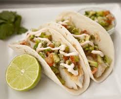 In a separate bowl, mix the mayonnaise, sour cream and sriracha hot sauce. Cod Fish Tacos