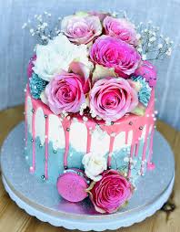 Buttercream cake with fresh flowers, drip and macarons from 120.00 the colour of your cake flowers and macarons can be changed to suit your theme. Gourmet Bouquet Cake 8 Inches Birthday Cakes French Macaroons Pastries Online