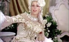 Mae’s back, baby — and she’s never been bolder. Carol Burnett brought