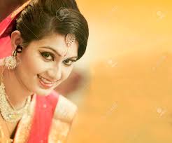 Check spelling or type a new query. Stunning Indian Bride Dressed In Hindu Red Traditional Wedding Clothes Sari Embroidered With Gold Jewelry And A Veil Smiles Tender With Extra Copy Space Stock Photo Picture And Royalty Free Image Image
