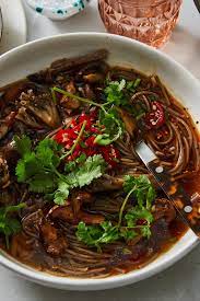 Spicy Noodle Soup With Mushrooms And Herbs Recipe Nyt Cooking Nyt Cooking Spicy Noodles Stuffed Mushrooms