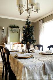 The dining table decoration is simple but elegant, the decorative mirror has fantastic details and the unique chairs just the right pattern. Table Decorations And Dining Room Decorating Ideas For Christmas Major Hoff Takes A Wife Family Recipes Travel Inspiration