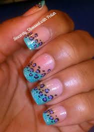 The first step taken where to cover the tip of the nail in a white polish with a burnt orange colored finish. Blue Cheetah Print Nail Designs Anna Charlotta