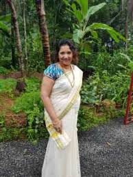 Devi mural design tissue kasavu saree. Draped In The Warmth Of A Kerala Wedding Mommying Babyt