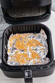See the official cooking instructions on our sister site here. Air Fryer Popcorn Pinkwhen