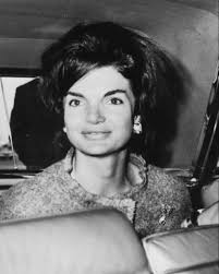 FIRST LADY ARRIVES New York: Mrs. Jacqueline Kennedy, wife of the U.S.  President, leaves LaGuardia Airport by auto upon arriving here September  25th. Mrs. Kennedy went to the United Nations to hear