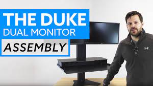 Gizmag tries out the duke, a sitting/standing desk converter. Assembly The Duke Dual Monitor Adjustable Stand Up Desk Youtube