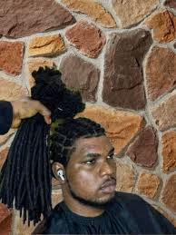 So I'm thinking about getting braids over my locs. It's also time for a  re-loc. Should I get the re-loc or just get the braids?