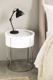 It comes outfitted with a single drawer and shelf to both stow headphones and eye masks, and show off books, succulents and other coll… Next Sloane Marble Round 1 Drawer Bedside Table White Marble Bedside Tables White Bedside Table Bedside Table