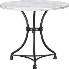Let the family gather around the table for dinner and long conversations afterward. French Kitchen Round Bistro Table Bistro Table Dining Table Dining Table In Kitchen