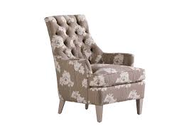 A Muted Floral Print Lends A Romantic Touch To Jessica Charles The Hollans Chair A Deep Diamond Tufted Back Adds De Stationary Chairs Chair Living Room Chairs